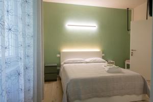 Postel nebo postele na pokoji v ubytování B&B Al Parco