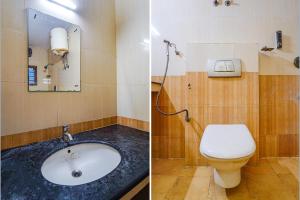 a bathroom with a sink and a toilet at FabExpress Harma Residency in Chennai