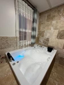 Koupelna v ubytování Dirilis Banarya Apart hotel + 37 fotografií