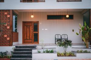 Exteriér nebo vchod ubytování Poojaris Nirantara - Mysuru