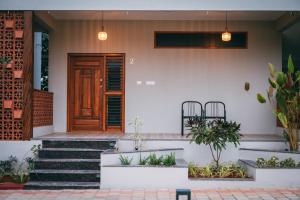 Exteriér nebo vchod ubytování Poojaris Nirantara - Mysuru