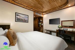 Giường trong phòng chung tại Sapa Green Hotel
