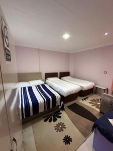 Postel nebo postele na pokoji v ubytování Dirilis Banarya Apart hotel