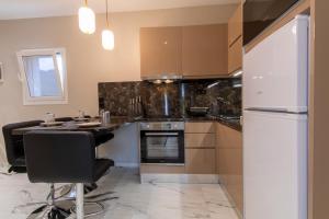 Kuchyň nebo kuchyňský kout v ubytování Evelina Luxury Suites in Corfu