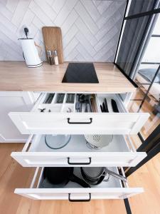 Kuchyň nebo kuchyňský kout v ubytování Apartmán TYRŠOVKA