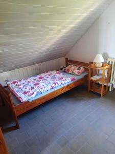 Postel nebo postele na pokoji v ubytování WineBerry Apartment