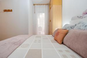 Postel nebo postele na pokoji v ubytování Edificio Simancas