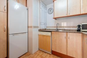 Kuchyň nebo kuchyňský kout v ubytování Edificio Simancas