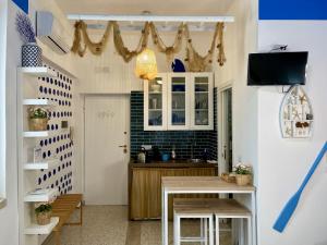 Μια τηλεόραση ή/και κέντρο ψυχαγωγίας στο La Casa del Pescatore n 33 - porto di St Spirito Bari