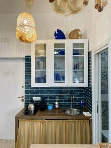 Η κουζίνα ή μικρή κουζίνα στο La Casa del Pescatore n 33 - porto di St Spirito Bari +37 φωτογραφίες