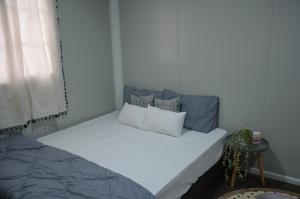 Кровать или кровати в номере The Vanilla Cabin