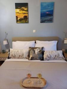 Postel nebo postele na pokoji v ubytování Berry House Nikiti