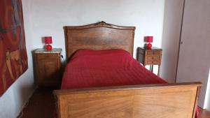 Кровать или кровати в номере Glycines et jasmins