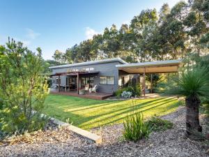 a home with a large yard with trees at Vines and Stars in Yallingup