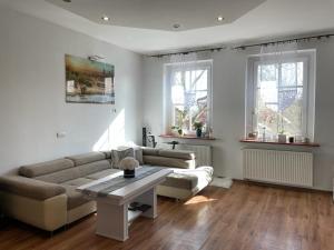 Posezení v ubytování Apartament Muszelka