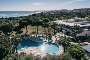 an aerial view of a resort with a swimming pool at MClub Alicudi in Sciacca