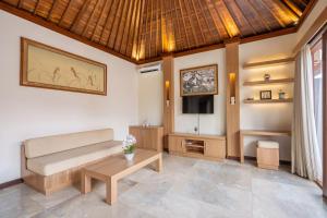 Μια τηλεόραση ή/και κέντρο ψυχαγωγίας στο Kings Villas Sanur by Moria
