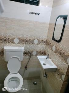 Koupelna v ubytování NIDHIVAN P. GUEST HOUSE