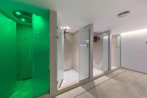 Ванная комната в VIVA Cala Mesquida Resort & Spa
