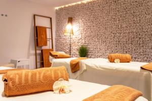 Кровать или кровати в номере VIVA Cala Mesquida Resort & Spa