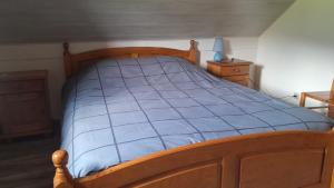 Llit o llits en una habitació de Charmant Duplex, vue magnifique