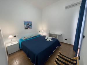 Postel nebo postele na pokoji v ubytování B&B Scala dei Turchi Beach
