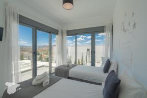 Postel nebo postele na pokoji v ubytování CostaBlancaDreams Villa Miro in Javea