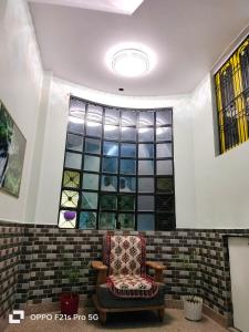 Posezení v ubytování NIDHIVAN P. GUEST HOUSE