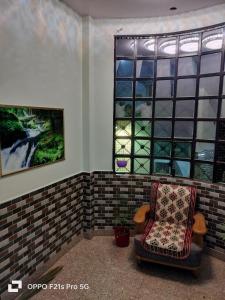 Posezení v ubytování NIDHIVAN P. GUEST HOUSE