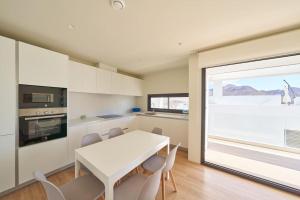 Kuchyň nebo kuchyňský kout v ubytování aguarosa