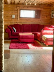 A seating area at Sampo Chalet with Hot Tub