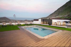 a swimming pool on top of a house at Villa Nahuel in Santa Cruz de Tenerife