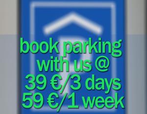 a sign that reads book parking with us a days at statthaus - statt hotel in Cologne
