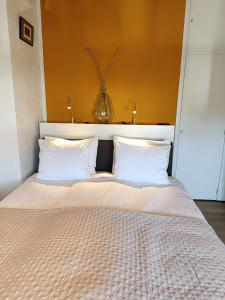 Postel nebo postele na pokoji v ubytování Appartement Zuid 5