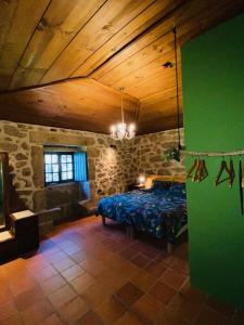 Ένα ή περισσότερα κρεβάτια σε δωμάτιο στο Quinta Abelha