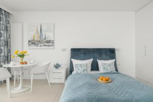 Posteľ alebo postele v izbe v ubytovaní Aquamarina Prima Studio by the BEACH by Noclegi Renters