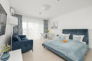 Posteľ alebo postele v izbe v ubytovaní Aquamarina Prima Studio by the BEACH by Noclegi Renters