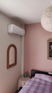 A bed or beds in a room at Serenity Villa-1st floor-Sea view- sea 150m away