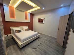 Ένα ή περισσότερα κρεβάτια σε δωμάτιο στο Resid’homes Appart’hotel Saint-Louis