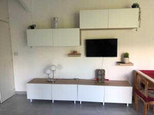 TV a/nebo společenská místnost v ubytování Rosa in Fiore