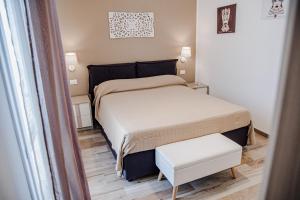 Postel nebo postele na pokoji v ubytování Casa Corallo San Vito