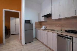 Η κουζίνα ή μικρή κουζίνα στο Apartamenty Emilia 2