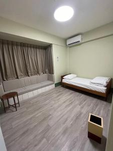 Postel nebo postele na pokoji v ubytování Nobiggie lnn + 3 fotografie