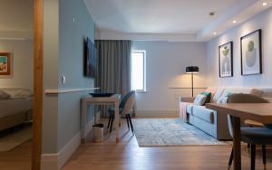 VIP Executive Suites do Marquês Hotel客房内的一张或多张床位