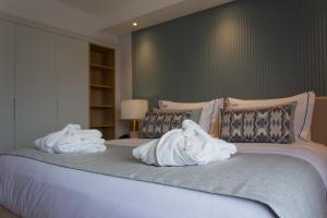 VIP Executive Suites do Marquês Hotel客房内的一张或多张床位