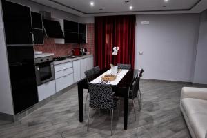 Kuchyň nebo kuchyňský kout v ubytování Villa Rea comfort e relax