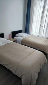 Una cama o camas en una habitación de Appartement F3, proche paris