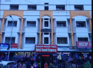 a building with a market in front of it at Anand Regency Majestic in Bangalore