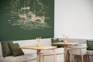 Istumisnurk majutusasutuses Apollo AchtQuartier Das Hotel am Mondsee