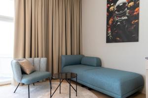 Istumisnurk majutusasutuses Apollo AchtQuartier Das Hotel am Mondsee